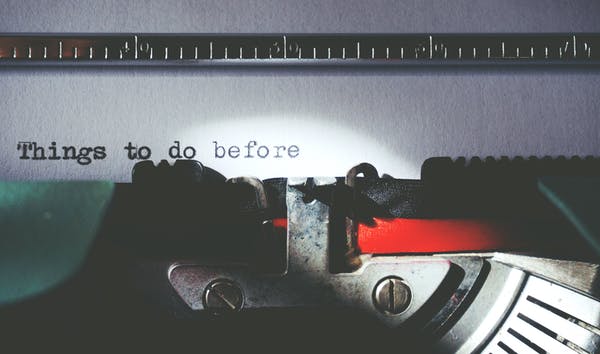 This is an image of a paper in a typewriter. It has the words " Things to do before " typed.