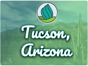 This image shows a desert area with cactus plants in the background. In the top center, there is the logo of NDC and below there is the text " Tucson Arizona"