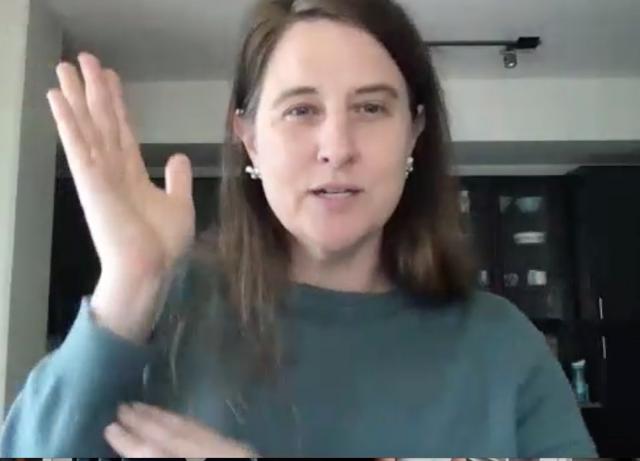 Stephanie Cawthon, PhD, a white woman with brown hair, signing into the camera.