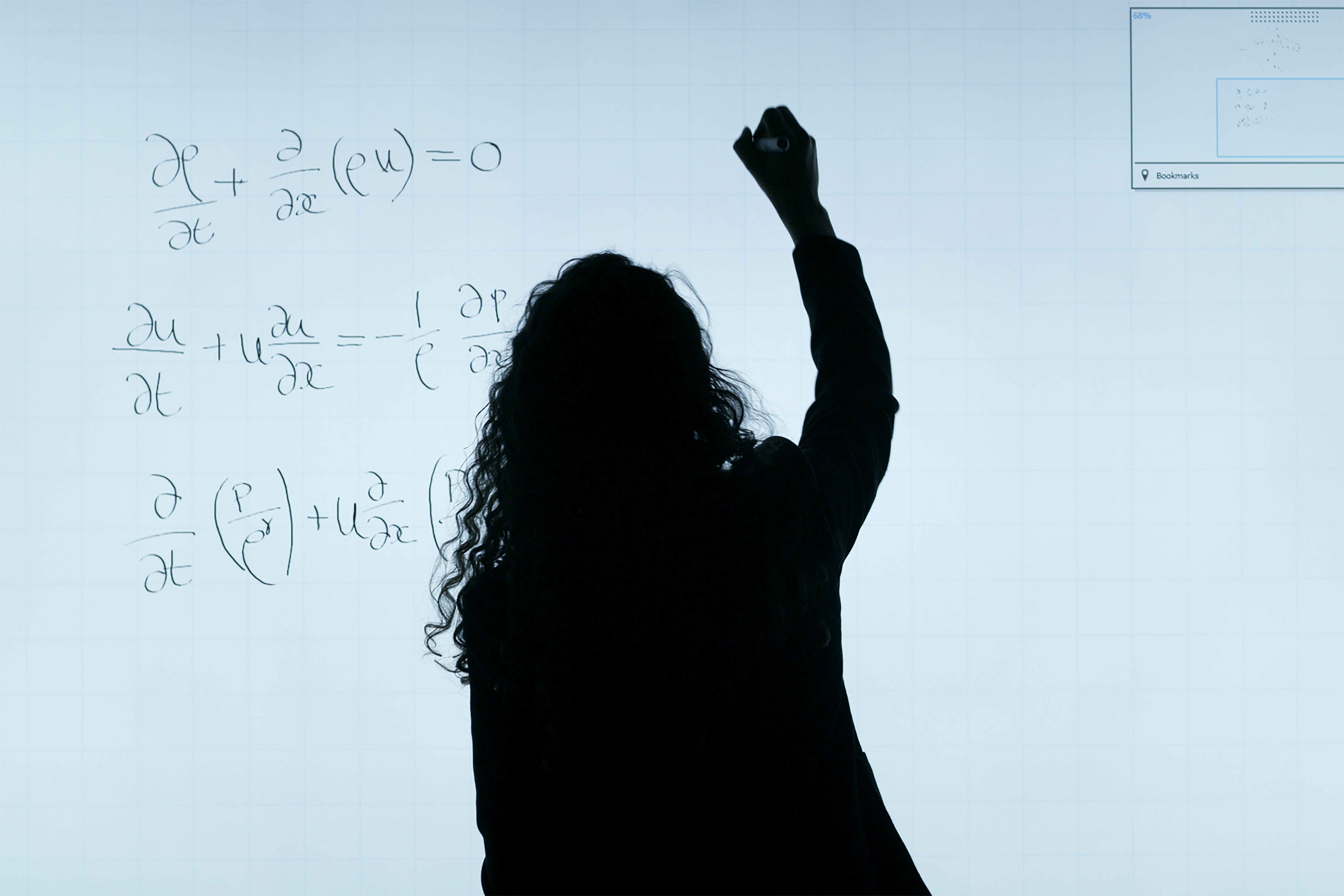 This image appears to be writing some mathematics formulas on a large digital screen.