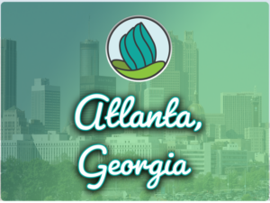 This image shows tall buildings in the background. In the top center, there is the logo of NDC and below there is the text " Atlanta Georgia"
