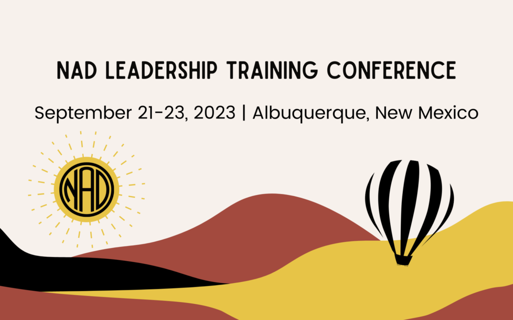 A poster for the NAD Leadership Training Conference that will take place from September 21-23, 2023 in Albuquerque, New Mexico. The image includes brown, yellow and black hills with a hot air balloon.