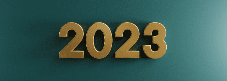 Green background with Gold 2023.