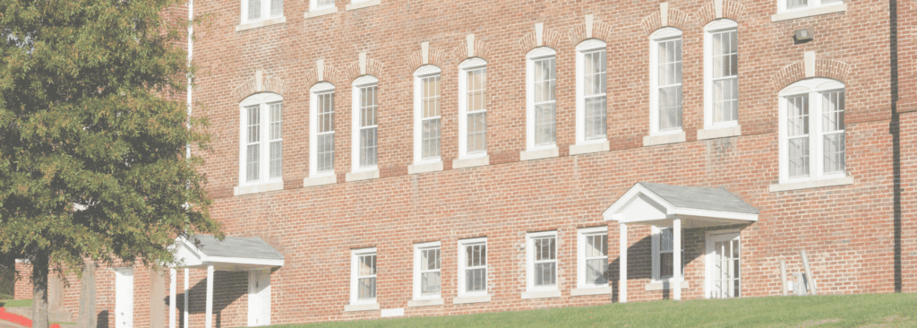 Exterior photo of a dorm building.