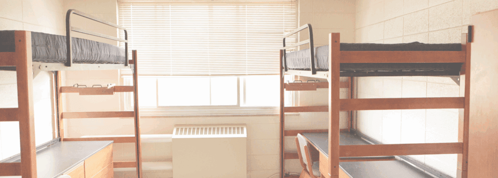 The interior of a dorm room.