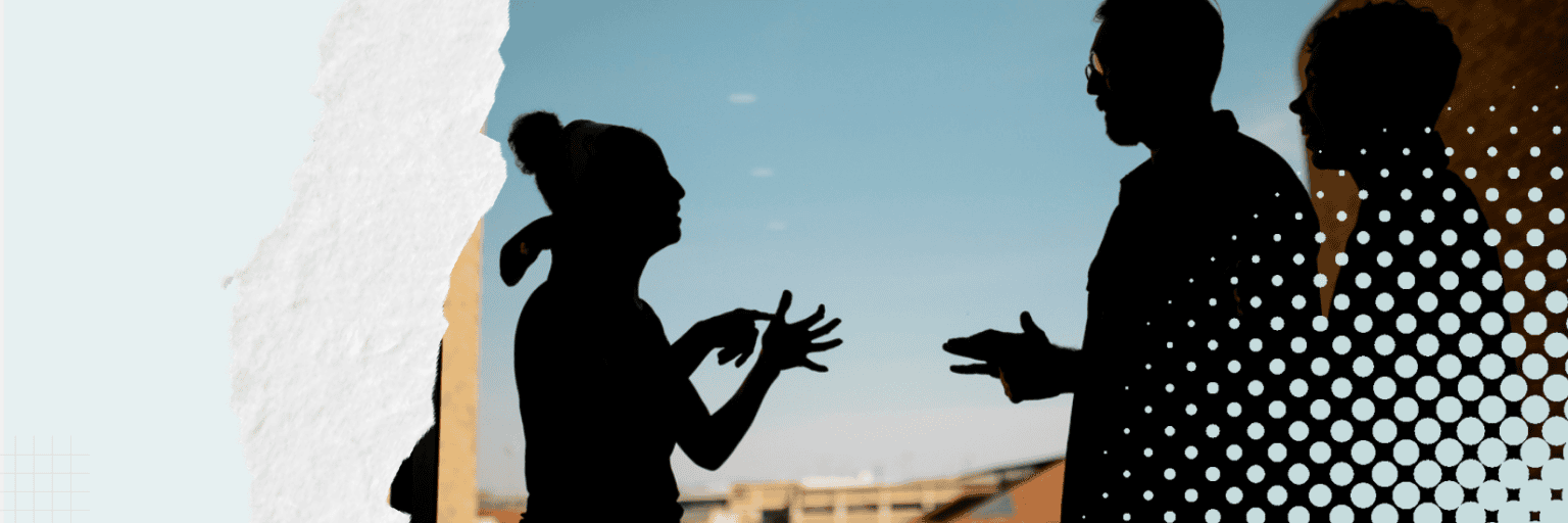 Silhuetas de personas comunicándose mediante lengua de señas.