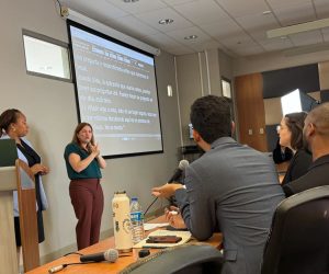 Tia & Kate presenting with Mariana Otaño (interpreter), Kenton Myers (interpreter), and Jose de Jesus (interpreter).